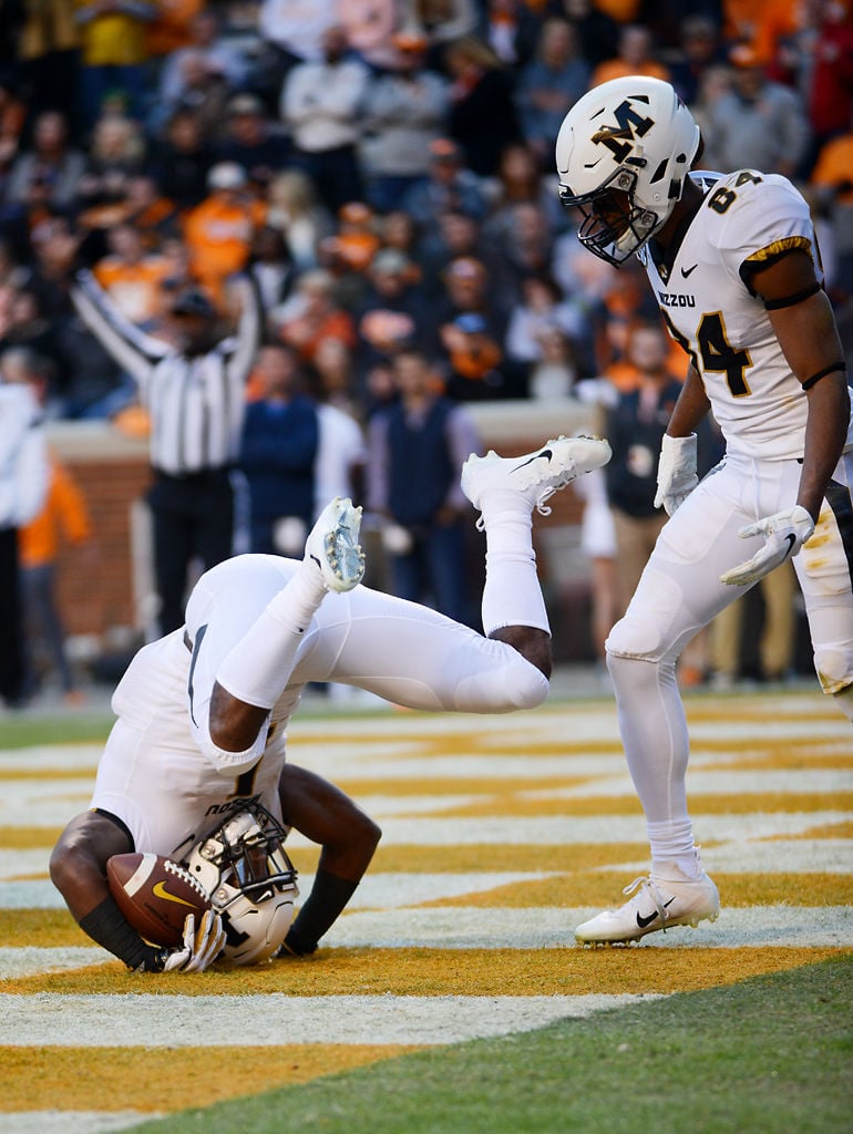 Missouri running back Tyler Badie rolls through the end zone